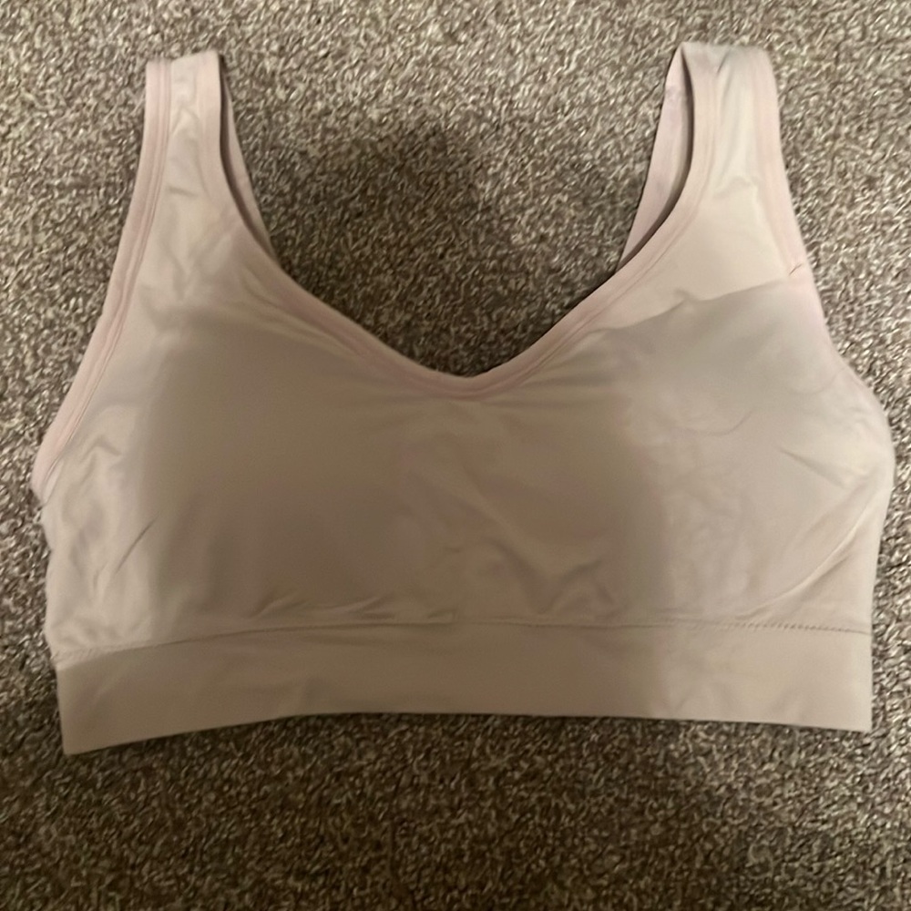 Never worn Jockey bra, no stains, freshly washed, size large! Light pink color